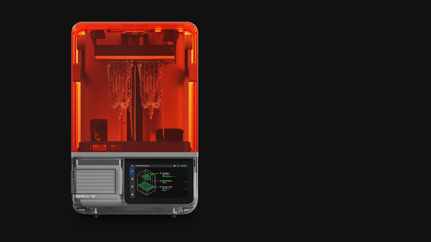 Form Studio 1 resin 3D printer with its orange cover closed