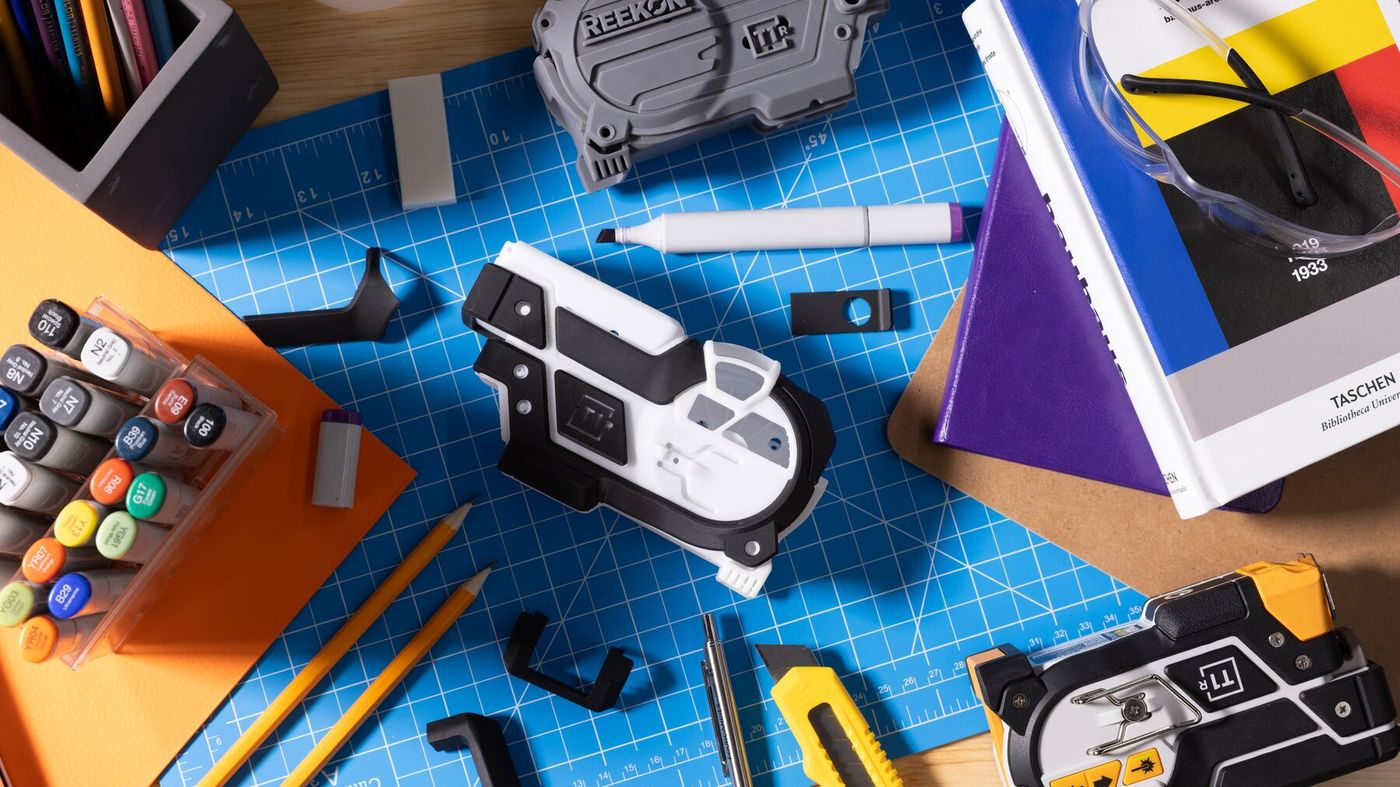 Printed device housing parts on a cutting mat