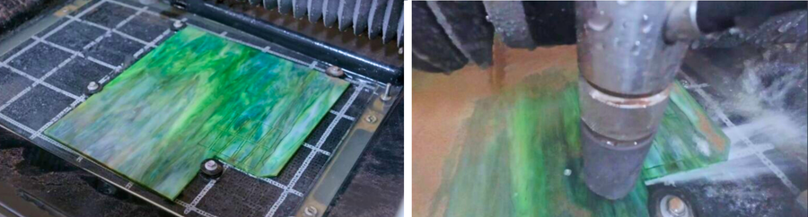CNC milling a green plastic sheet on a gridded work bed