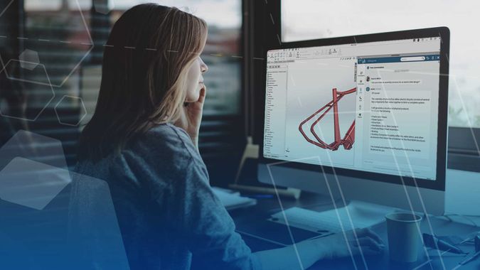 Engineer reviewing SOLIDWORKS design tools