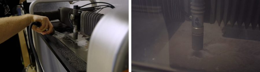 Waterjet cutter nozzle cutting material in a workshop machine
